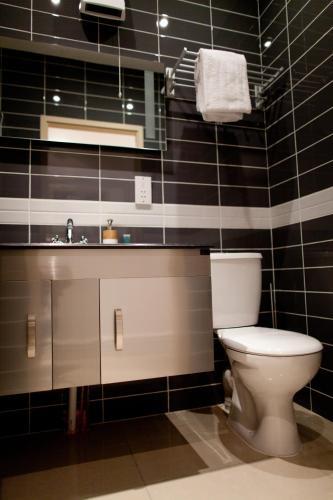 Foto del baño de Aparthotel Welcome Inn Victoria