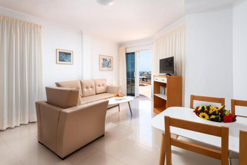 Foto de una habitación de Apartamentos Edificio Playa