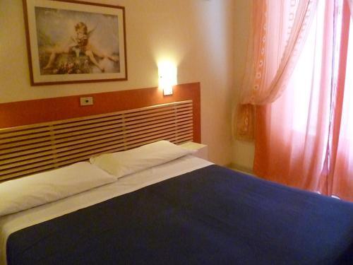 Foto de una habitación de Hotel Pensione Romeo