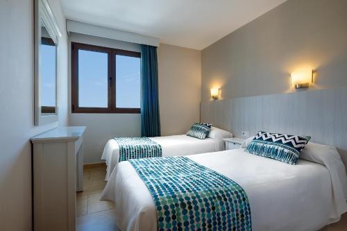 Foto de una habitación de Apartamentos Los Manueles