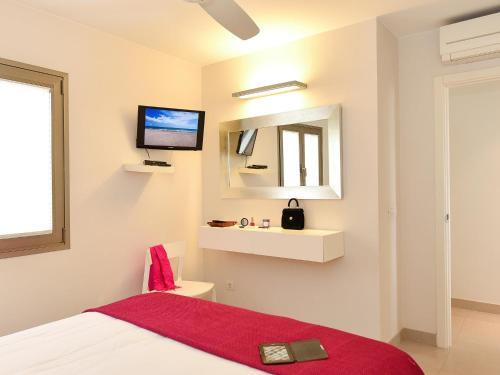 Foto de una habitación de San Agustin Beach Apartments