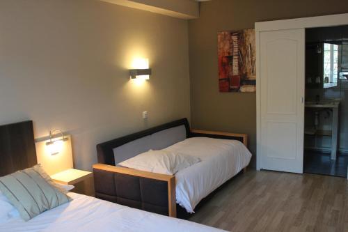 Foto de una habitación de Logis Hôtel Les Cimes