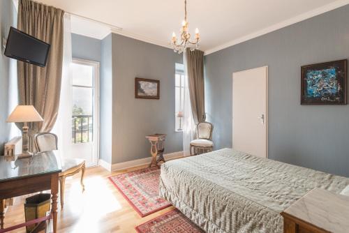 Foto de una habitación de Logis Hôtel Beau Site