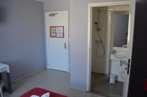 Foto del baño de Hôtel Restaurant Le Bellevue