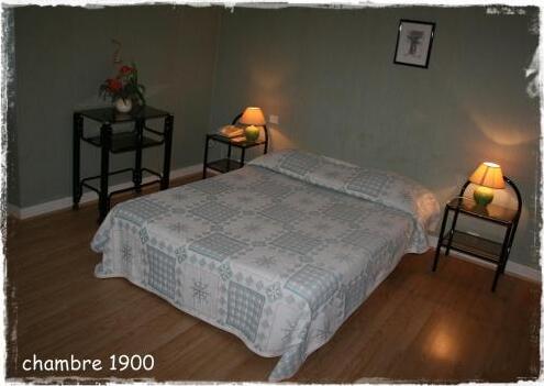 Foto de una habitación de Hôtel de La Paix