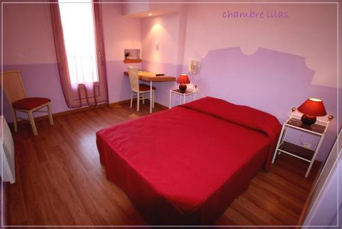 Foto de una habitación de Hôtel de La Paix