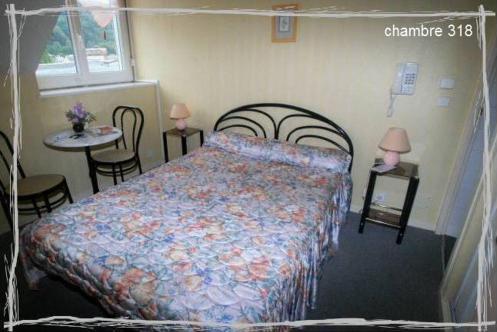 Foto de una habitación de Hôtel de La Paix
