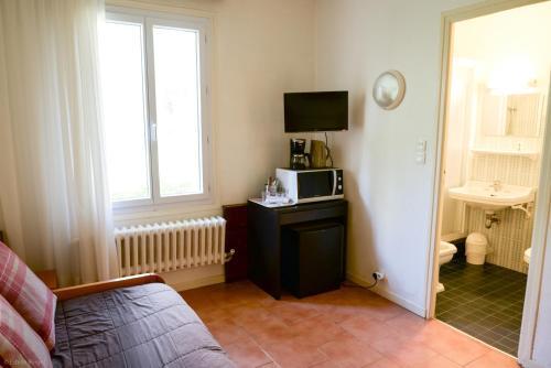 Foto de una habitación de Apartamentos Residence Les Cimes