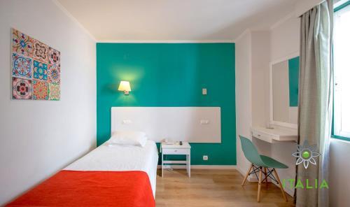 Foto de una habitación de Hotel Italia