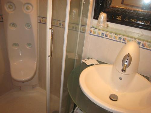 Foto de una habitación de Apartamentos Grifovacances Tres Estrelles Club