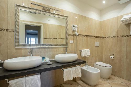 Foto del baño de Hotel Rex