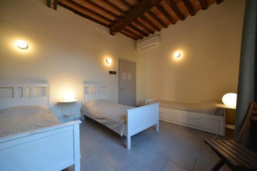 Foto de una habitación de Albergue Ostello Palazzo Nizza