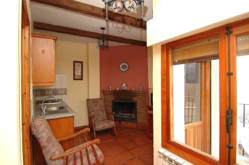Foto de una habitación de Apartamentos Turísticos Rural Los Tinaos