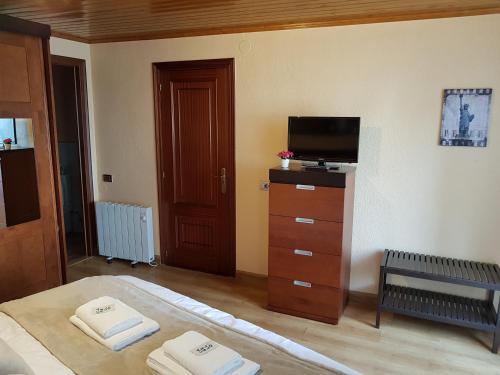 Foto de una habitación de Aqua Rooms Sarria