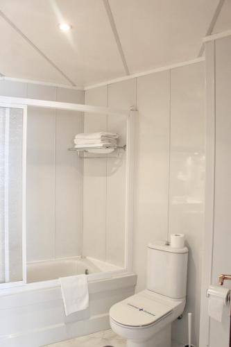 Foto del baño de Hotel As Camelias