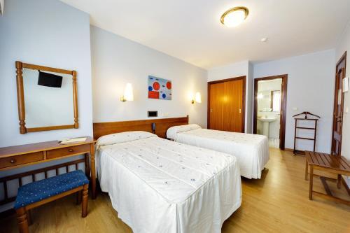 Foto de una habitación de Hotel As Camelias