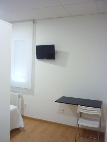 Foto de una habitación de Pensión-Albergue Puente Ribeira