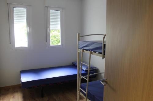 Foto de una habitación de Pensión-Albergue Puente Ribeira