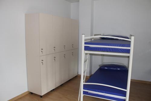 Foto de una habitación de Pensión-Albergue Puente Ribeira