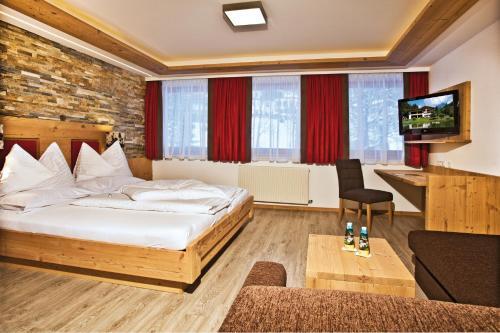Foto de una habitación de Landhotel Alpenhof Filzmoos