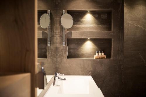 Foto del baño de Hotel Petrus