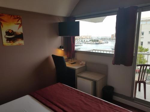 Foto de una habitación de Hôtel Port Beach