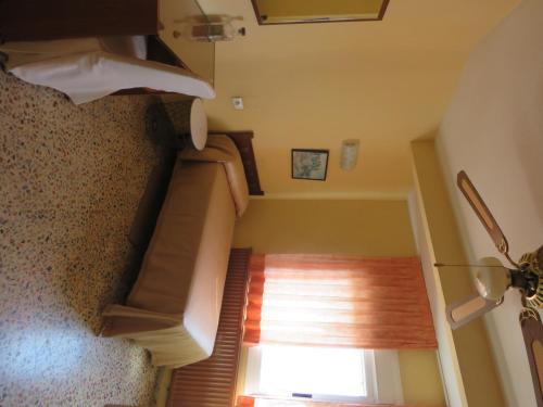 Foto de una habitación de Hotel Alain