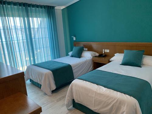 Foto de una habitación de Hotel Nueva Colina