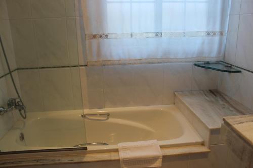 Foto del baño de Hotel Nueva Colina