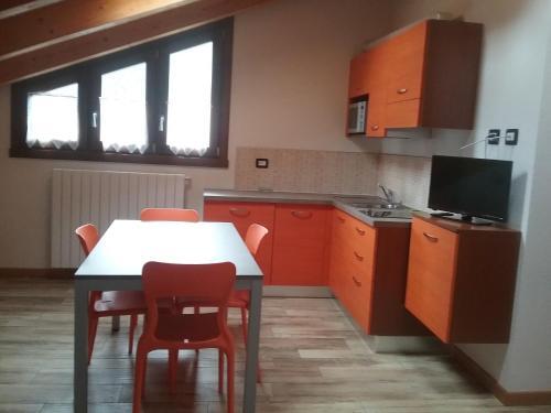 Foto de una habitación de Aparthotel Residence Acero Rosso