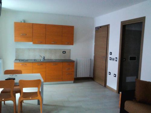 Foto de una habitación de Aparthotel Residence Acero Rosso