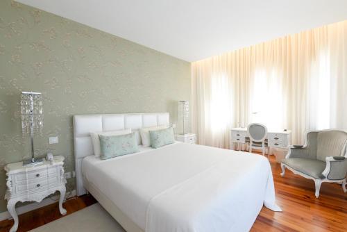 Foto de una habitación de Hotel Sundial Gardens &amp;amp; Suites