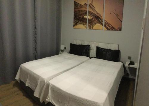 Foto de una habitación de Hotel H La Cabaña