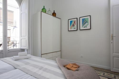 Foto de una habitación de Apartamentos SingularStays Parque Central