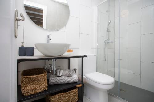 Foto del baño de Apartamentos SingularStays Parque Central
