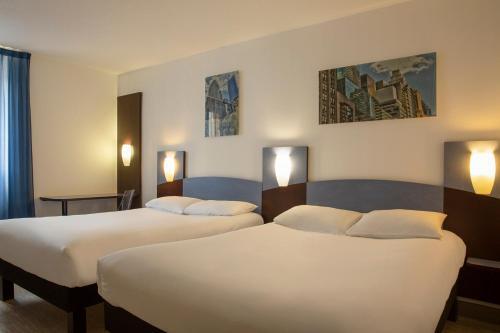 Foto de una habitación de The Originals Access, Hôtel Bourges Gare