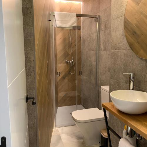 Foto del baño de Sweet Sevilla Suites