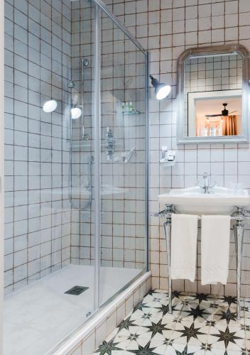 Foto del baño de Pensión Boutique Caravan Cinema
