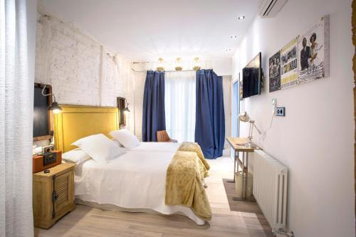 Foto de una habitación de Pensión Boutique Caravan Cinema