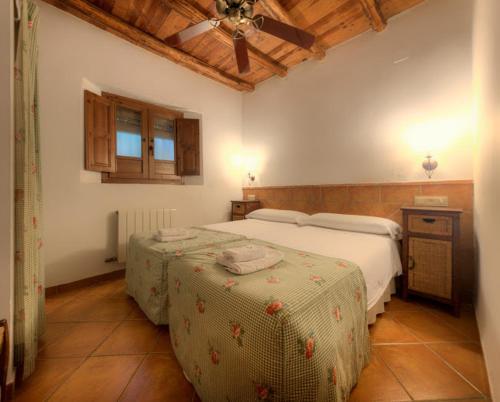 Foto de una habitación de Apartamentos Cortijo Balzain