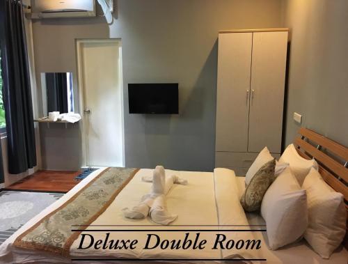 Foto de una habitación de Koimala Hotel
