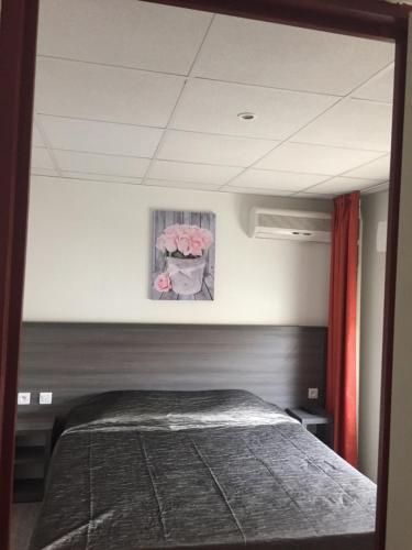 Foto de una habitación de Hôtel Le Neptune