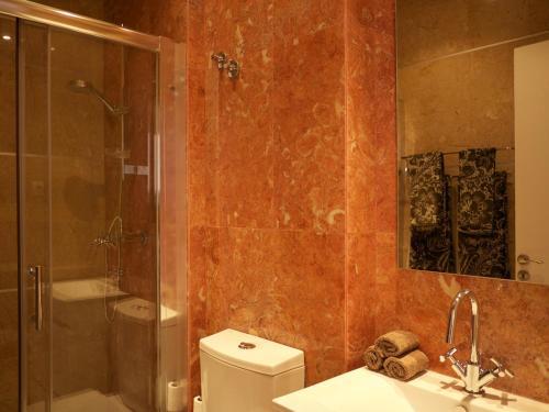 Foto del baño de Cacilhas Guest Apartments