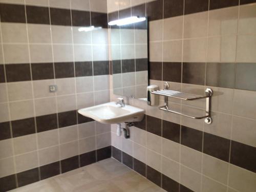 Foto del baño de Family Hôtel - Site du Parc