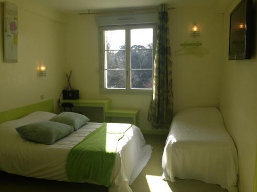 Foto de una habitación de Family Hôtel - Site du Parc