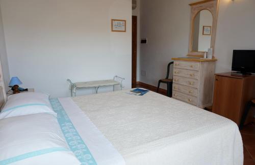 Foto de una habitación de Hotel Piccolo Pevero