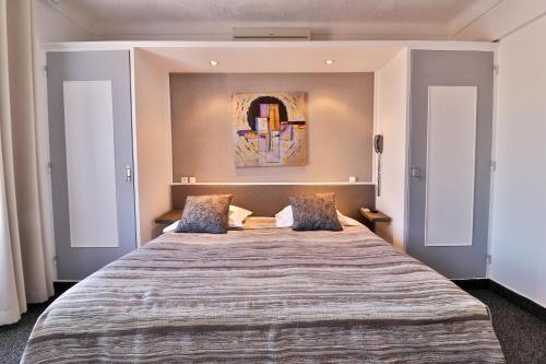 Foto de una habitación de Hôtel le Chardon Bleu