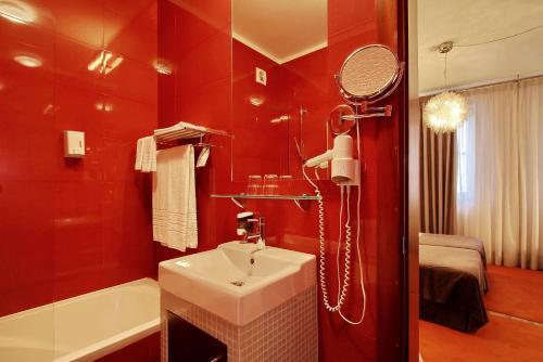 Foto del baño de Hotel Mestre de Avis