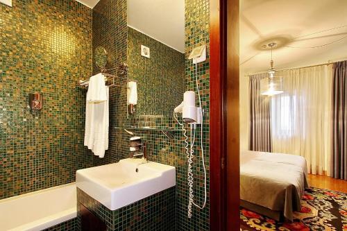 Foto del baño de Hotel Mestre de Avis
