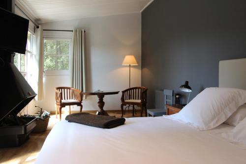 Foto de una habitación de Hotel Can Barrina